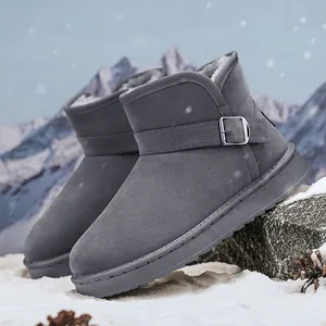 Grey winter snow boots featuring warm plush lining and a decorative metal buckle strap