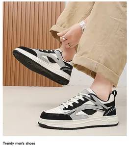 Detailed side view of trendy men's thick-soled sneakers in black and white colorway