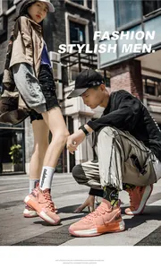 Baskets de basketball orange élégantes avec maille respirante pour hommes et femmes sportifs