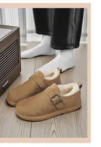 Close-up of men's winter Birkenstock shoes with thick faux fur lining and buckle