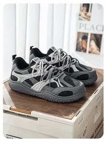 Detailed view of retro wide-toe sneakers with thick non-slip soles for outdoor use.