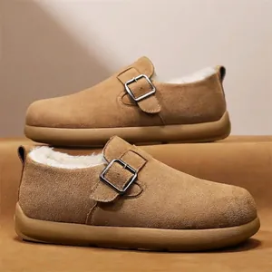 Men's thick-soled brown suede fleece-lined Birkenstock-style clogs for winter warmth.