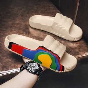 Comfortable thick-soled cloud slides with colorful side accents for casual summer wear