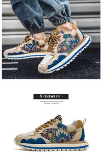 Side view of multi-colored low-top sneakers with ethnic patterned embroidery details