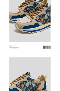 Detailed close-up of men's low top patchwork sneakers featuring ethnic fabric patterns