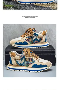 Detailed side view of color-blocked men's casual sneakers with intricate ethnic patterns.