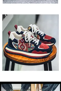 Detailed side view of ethnic pattern color-block platform sneakers for men in outdoors