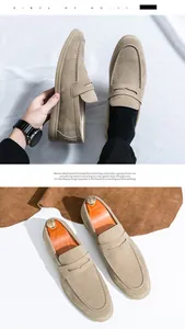 Detail view of premium beige suede loafers for men featuring retro business casual design