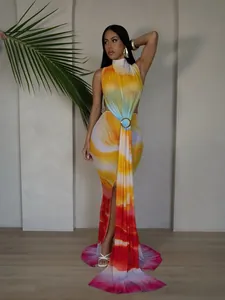 Elegant gradient print sleeveless maxi dress with waist ring detail and high side slit.