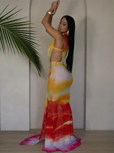 Detail of a colorful gradient backless maxi dress with bandage design and slim fit
