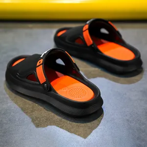 Comfortabele heren trendy EVA strand slippers met dikke zool in zwart en oranje