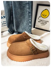 Detailed view of brown platform Birkenstock-style mules with warm fleece lining and buckle.