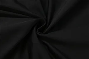 Macro-opname van hoogwaardige zwarte ademende stoftextuur voor dames bodysuits