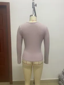 Rear view detail of a mauve long-sleeve ribbed slim fit basic T-shirt on a mannequin
