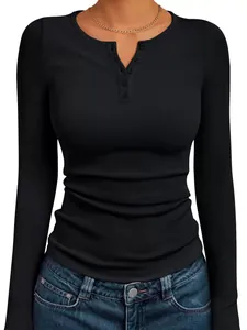 Close-up of women's slim fit black ribbed long-sleeve Henley top showing button detail.