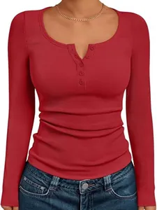 Detailed view of women's red ribbed long sleeve Henley top with buttons and slim fit design