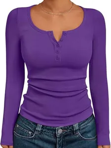 Close-up detail of purple ribbed long sleeve henley shirt showing texture and buttons