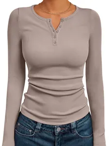 Close-up detail of a women's slim fit ribbed Henley long sleeve top in mauve purple
