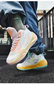 Close-up detail of stylish color-block mid-top basketball sneakers with thick platform soles