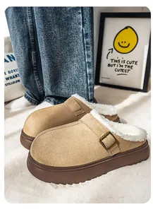 Detailed side view of khaki suede platform clogs with warm white faux fur lining