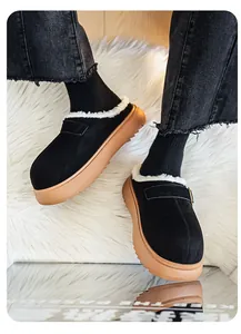 Men's platform clogs with black suede upper and warm white plush lining detail