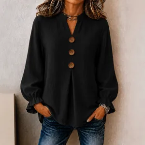 Women's black V-neck long sleeve blouse with wooden buttons and ruffled cuffs