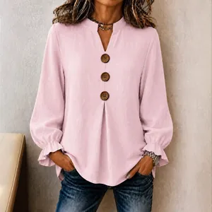 Elegant pink long sleeve V-neck blouse with decorative buttons and ruffle cuffs for women