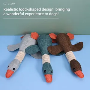 Plush squeaky goose dog toy with durable bite-resistant texture for dental cleaning