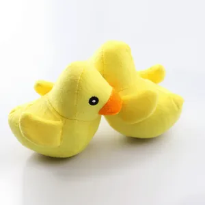 Cute plush squeaky yellow duck toy for pets, soft interactive duckling doll for play.
