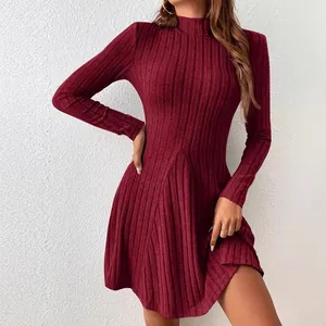 Elegant burgundy ribbed knit dress with mock neck and slim fit A-line silhouette