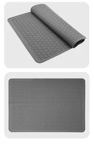 Dettaglio del tappetino scolapiatti in silicone grigio con scanalature antiscivolo termiche