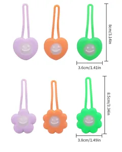 Detailed dimensions for heart and flower shaped silicone LED pet safety pendants in three colors.