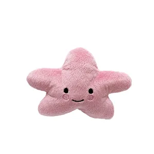 Cute pink star-shaped plush pet toy with embroidered smiley face for dogs and cats