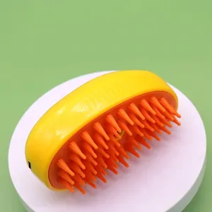 Mango-shaped pet spray comb for cats with soft silicone bristles for grooming and massage