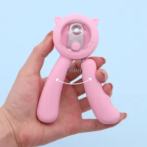 Coupe-griffes ergonomique rose pour chat avec trou rond pour une coupe sécurisée
