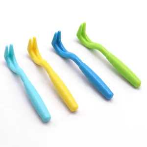 Set of four colorful plastic pet tick remover hooks for dogs and cats.