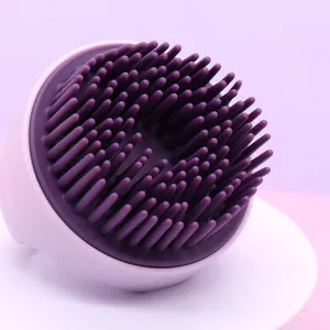 Silicone pet bath brush for dogs and cats featuring soft purple massage bristles