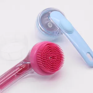 Dual-color long-handle pet bath brushes with soft silicone bristles for dog grooming.