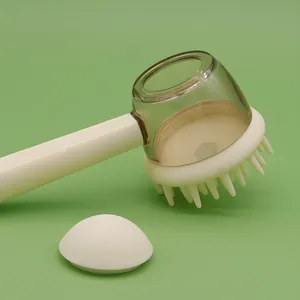 Long-handled pet bath brush with soft silicone massage bristles and cream-white finish