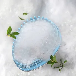 Blue silicone pet bath massage brush with liquid dispensing feature and soft bristles