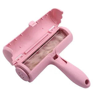Pink electrostatic pet hair remover roller for dogs and cats on sofa and clothes
