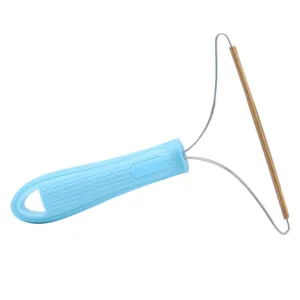 Levapelucchi manuale portatile con manico blu per peli di animali e pelucchi tessuti
