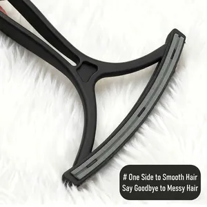 Double-sided pet hair remover tool for carpet and sofa on white fur background