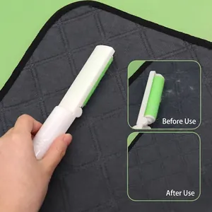 Portable foldable washable lint roller for pet hair removal, white and green design.