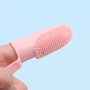 Cepillo de dientes de silicona rosa para el cuidado dental y la limpieza oral de mascotas