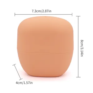 Apricot egg-shaped silicone pet bath massage brush showing precise dimension measurements