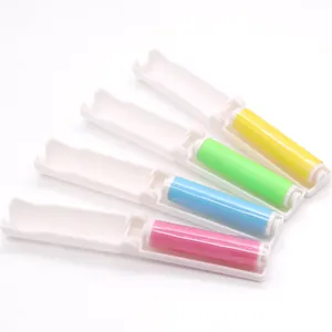 Set of four colorful mini foldable reusable washable lint rollers for pet hair removal