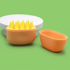 Vibrant orange and yellow portable silicone pet massage bath brush with lid for dogs and cats