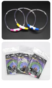 Detail view of LED dog safety necklaces in various colors with retail packaging and USB cables