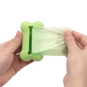 Dispensador de bolsas para excrementos de mascotas de silicona con forma de hueso portátil